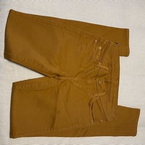 7 for All Mankind colored skinny Jean. Deep mustard yellow color